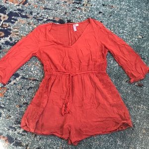 Orange long sleeve romper
